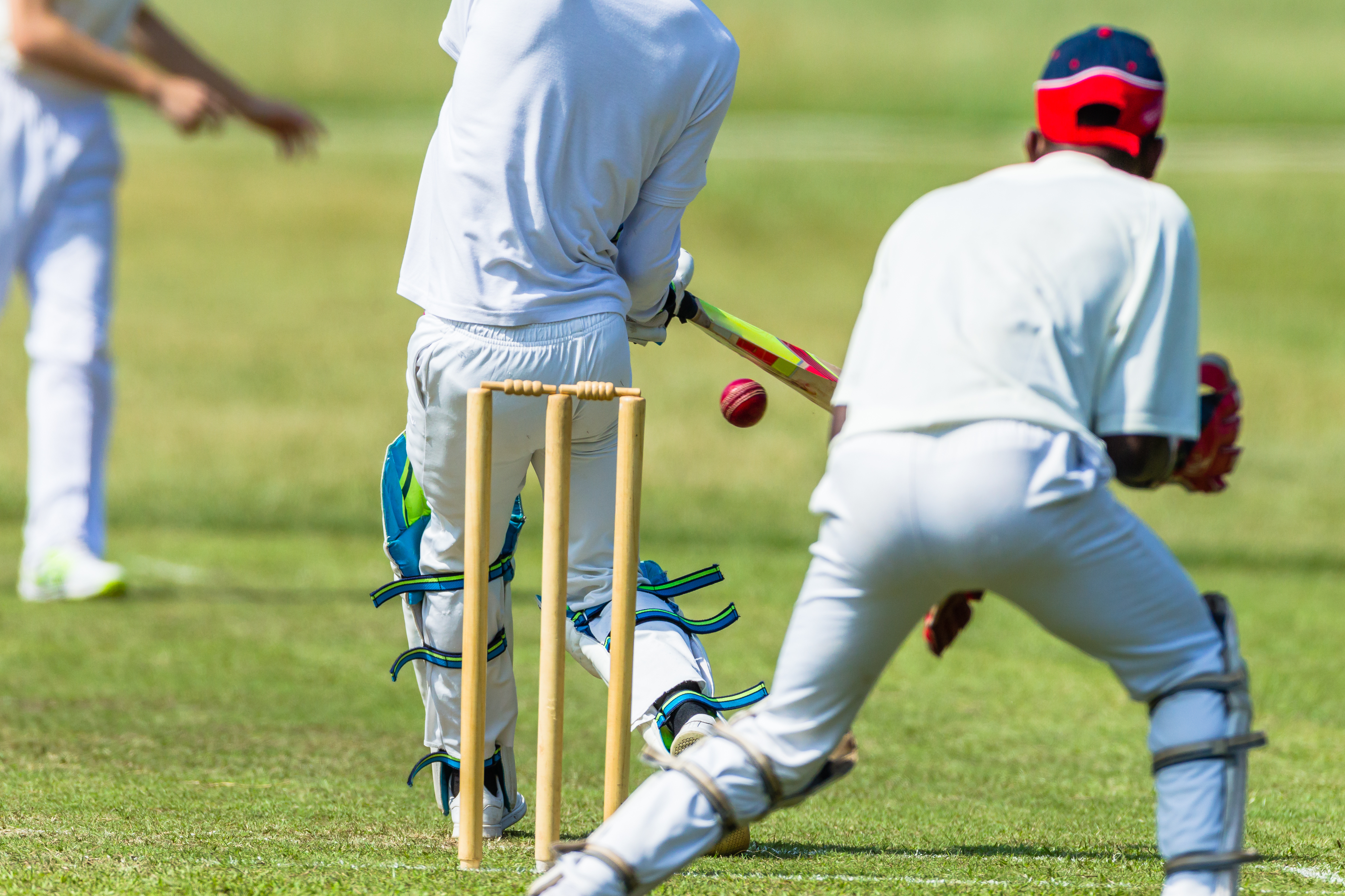 Cricket players in action - finding local matches