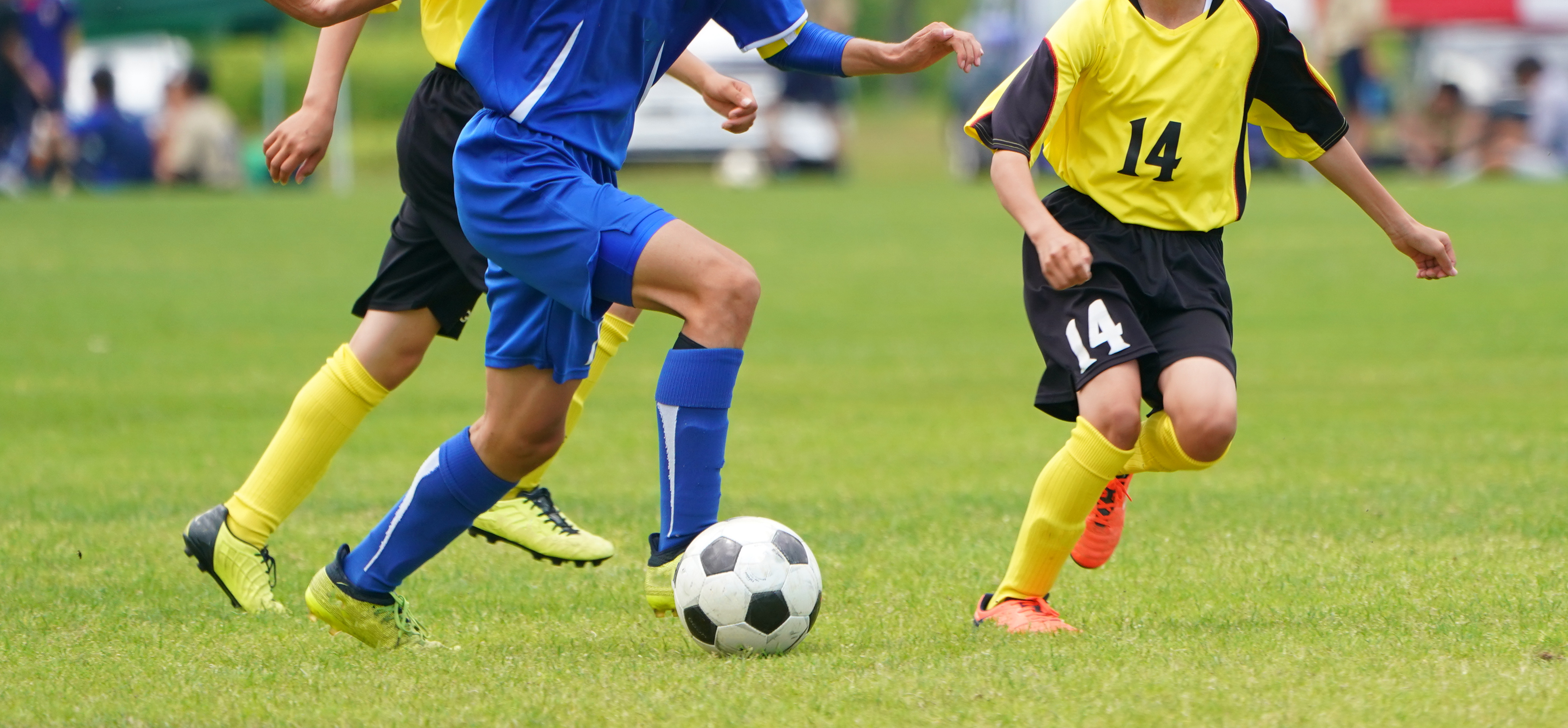 Football players in action - finding local games